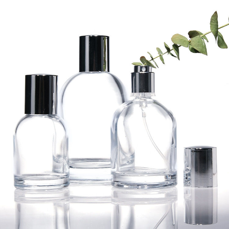 豪華 30ml 50ml 100ml 厚い壁付き方形 丸いガラスの香水瓶 木製キャップとカスタムデザインの箱
