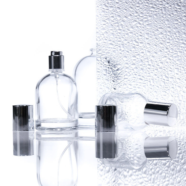 豪華 30ml 50ml 100ml 厚い壁付き方形 丸いガラスの香水瓶 木製キャップとカスタムデザインの箱